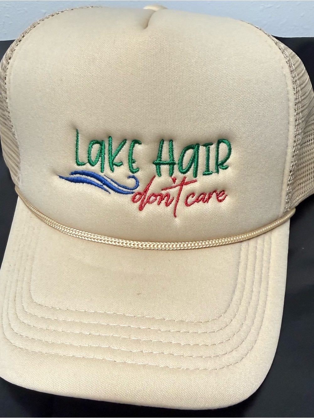 Beige Trucker Hat with 'Lake Hair don't care' Embroidery